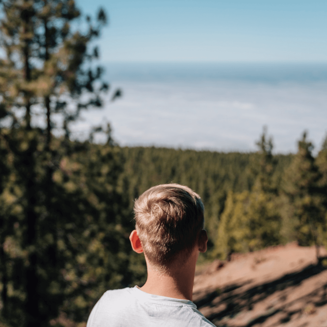 A young man looking out over Mount Teide in Tenerife
